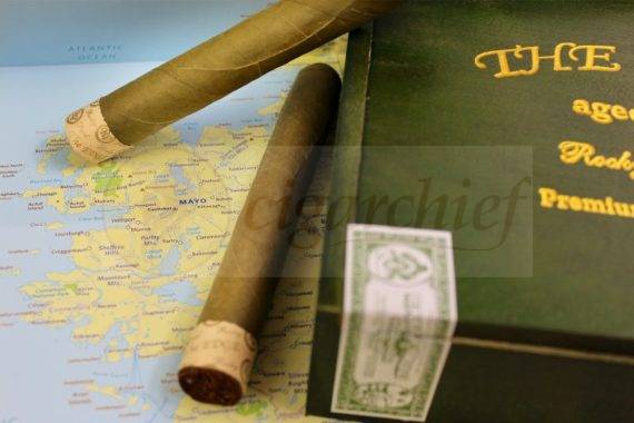 Rocky Patel Cigars The Edge Candela Toro Two Single Cigars on Full Box of Cigars World Map