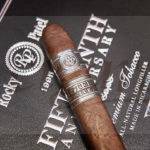 Rocky Patel Cigars 15th Anniversary Robusto Single Cigar Logo Background