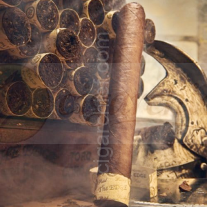 Rocky Patel Cigars The Edge Corojo Toro Single Cigar Leaning Against Bundle of Cigars