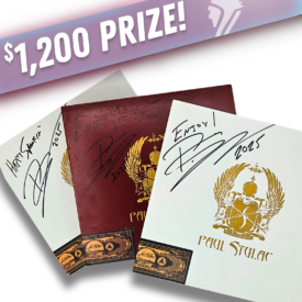 Three signed Paul Stulac cigar boxes—two white White Blinding Light and one red Red Screaming Sun—each autographed by Paul Stulac with '2025' written on them. A banner at the top reads '$1,200 PRIZE!' with a purple gradient background and a subtle Chief logo.